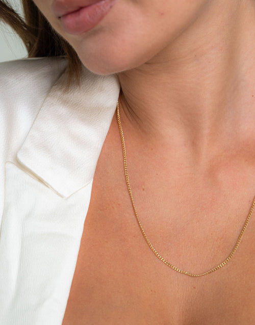 18K gold-filled Amelia Chain featuring a refined 2mm Cuban link design, high-polish finish and secure lobster clasp.
